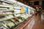 abstract blur organic fresh fruits and vegetable on grocery shelves in supermarket store defocused bokeh light background